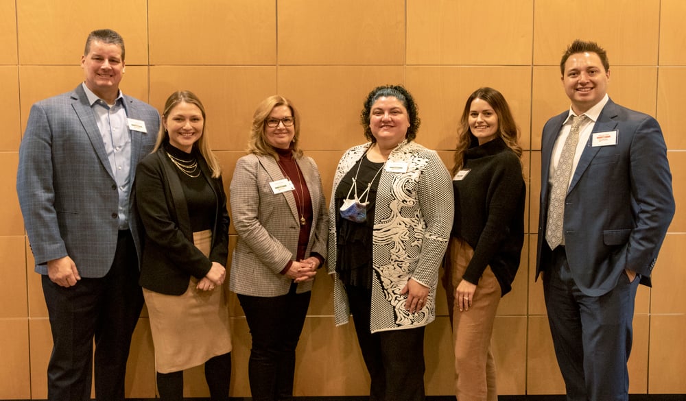 Photo of 4 Investor Forum panelists and 2 GRP team members